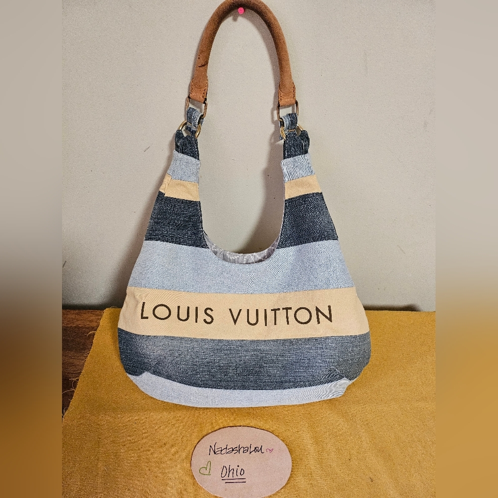 Repurposed upcycled denim hobo bag made with authentic LV dustbag